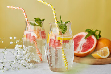 Detox diet vitaminized water. Refreshing summer cocktails with citrus fruits. Low alcohol, zero...
