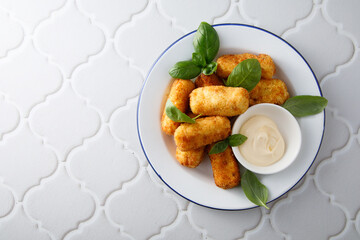 Traditional homemade croquettes with sauce