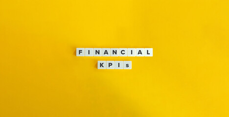 Financial KPIs (Key Performance Indicators). Revenue Growth Rate, Net Profit Margin, Return on Investment (ROI), Economic Value Added (EVA). Text on Block Letter Tiles. 