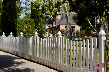 charming white picket fence around the yard