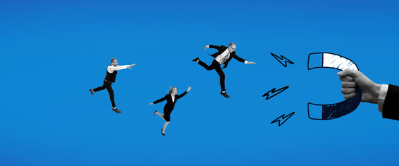Contemporary art collage. Office workers flying to magnet in hand against blue background. Human...