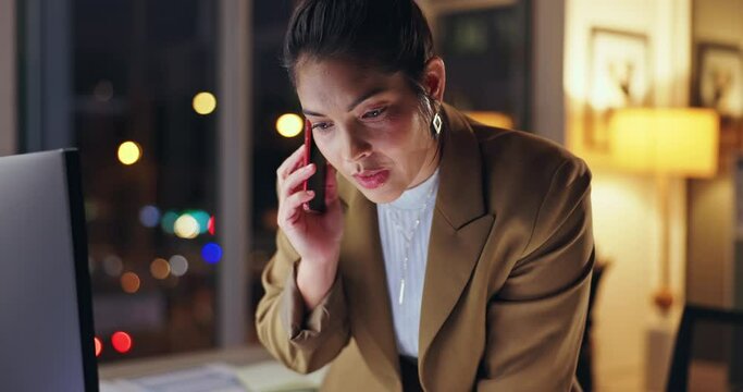 Business woman, talking and night with phone call for proposal or report on computer at office. Young female person or consultant in conversation or working late on mobile smartphone for discussion