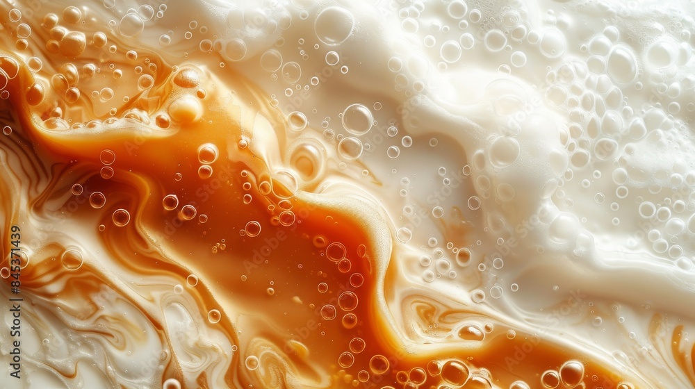 Poster close-up image showcasing the intricate patterns and bubbles formed within a foamy substance, with a