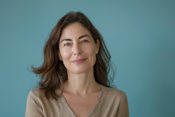 Fototapeta premium A close up portrait of a woman with a subtle smile
