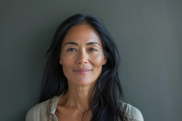 Fototapeta premium A close up portrait of a woman with a subtle smile