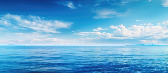 Obraz premium Blue seascape shiny blue sea horizon blue sky. Creative banner. Copyspace image