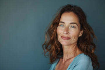 Fototapeta premium A close up portrait of a woman with a subtle smile