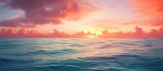 Fototapeta premium Early morning sun by the sea. Creative banner. Copyspace image