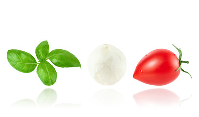 Flying ingredients for Italian salad with mozzarella cheese, tomato and basil leaves