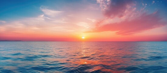 Obraz premium Seascape sunrise or sunset on the horizon. Creative banner. Copyspace image