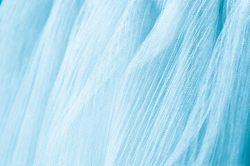 closeup of blue corrugated organza textured background