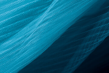 closeup of blue corrugated organza textured background