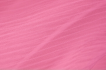 closeup of pink corrugated organza textured background