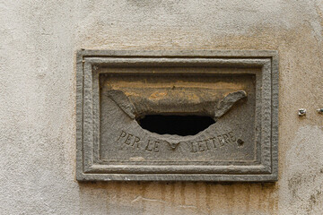Old stone mail box with the engraving 