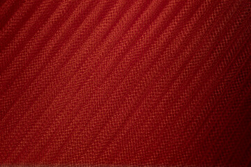 closeup of red corrugated organza textured background