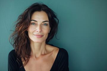 Fototapeta premium A close up portrait of a woman with a subtle smile