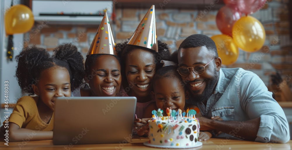 Wall mural Elderly man and two young girls celebrating a birthday with a cake and party hats, taking a selfie together