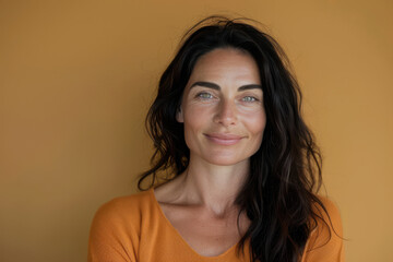 Fototapeta premium A close up portrait of a woman with a subtle smile
