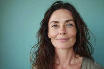 Fototapeta premium A close up portrait of a woman with a subtle smile