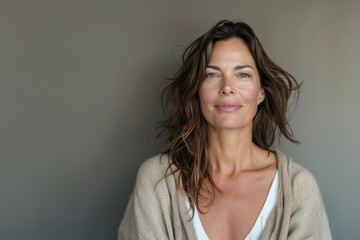 Fototapeta premium A close up portrait of a woman with a subtle smile