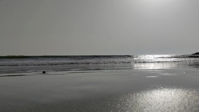 Tropical sea sunshine in afternoon and waves on exotic beach.