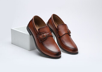 tan leather formal uniform shoes isolated on white background