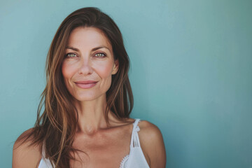 Fototapeta premium A close up portrait of a woman with a subtle smile