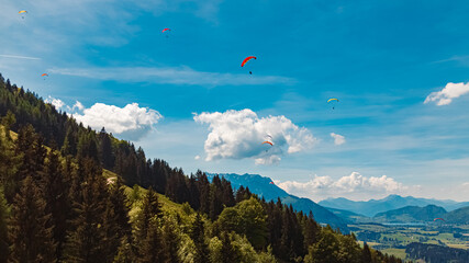 Alpine summer view with Mount Zahmer Kaiser seen from paraglider paradise Koessen, Kitzbuehel,...