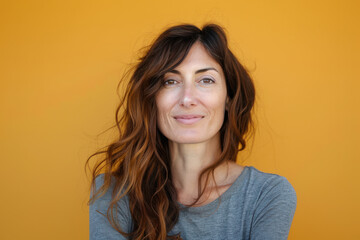 Fototapeta premium A close up portrait of a woman with a subtle smile