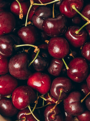 Fresh ripe sweet cherry background. Closeup, top view.