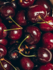 Fresh ripe sweet cherry background. Closeup, top view.