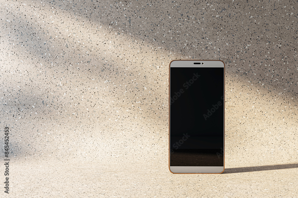 Poster smartphone with a blank screen standing on a textured terrazzo background, concept of modern mobile 