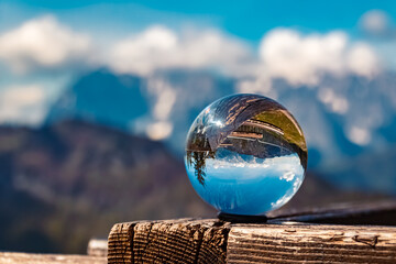 Crystal ball alpine summer landscape shot at paraglider paradise Koessen, Kitzbuehel, Tyrol, Austria