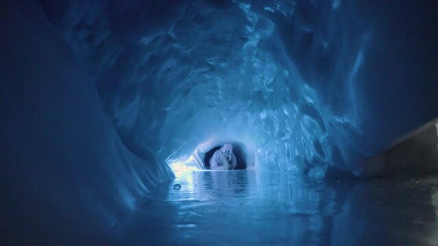 Mesmerizing ice cave featuring a crystal-clear lake, ideal for adventure, nature, and travel content showcasing extraordinary hiking and unforgettable holiday scenery