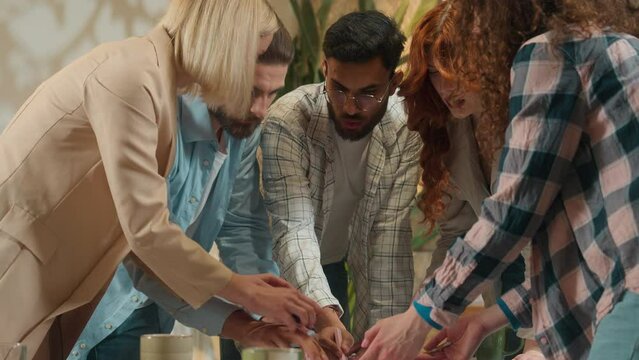 Business team designers architects group coworkers talk discuss architecture project in office multiethnic diverse men women girls guys students male female corporate teamwork design project coworking