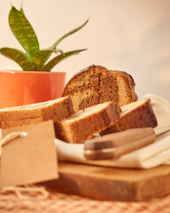 A marbled pudding on a board with a label for branding