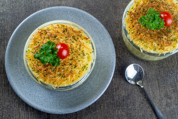 macaroni schotel. food made from macaroni, meat, cheese, milk and other ingredients cooked by baked. top view food