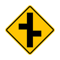 Fototapeta premium Unregulated intersection with an adjacent road. On both sides. Road merge sign. Road junction. A junction where one street or road intersects another. Diamond road sign. Warning yellow road sign.