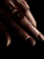 polished nails of the mannequin's hand
