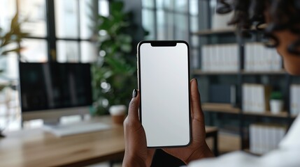 Digital Branding Mockup: Blank Mobile Phone Held by Businesswoman in Professional Office Setting