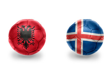 football balls with national flags of iceland and albania ,soccer teams. on the white background.