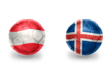 Obraz premium football balls with national flags of iceland and austria ,soccer teams. on the white background.