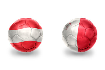 football balls with national flags of malta and austria ,soccer teams. on the white background.