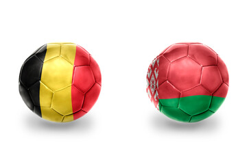 football balls with national flags of belarus and belgium ,soccer teams. on the white background.