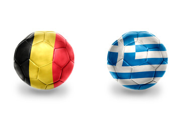 football balls with national flags of greece and belgium ,soccer teams. on the white background.