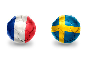 Obraz premium football balls with national flags of france and sweden ,soccer teams. on the white background.