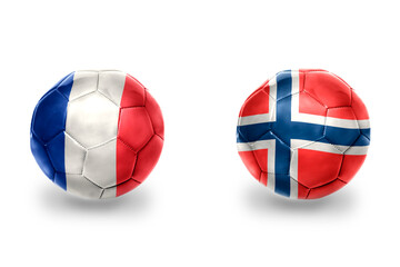 football balls with national flags of france and norway ,soccer teams. on the white background.