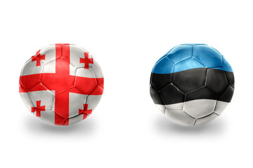 Obraz premium football balls with national flags of estonia and georgia ,soccer teams. on the white background.