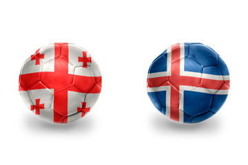 football balls with national flags of iceland and georgia ,soccer teams. on the white background.