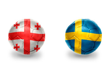 Obraz premium football balls with national flags of sweden and georgia ,soccer teams. on the white background.